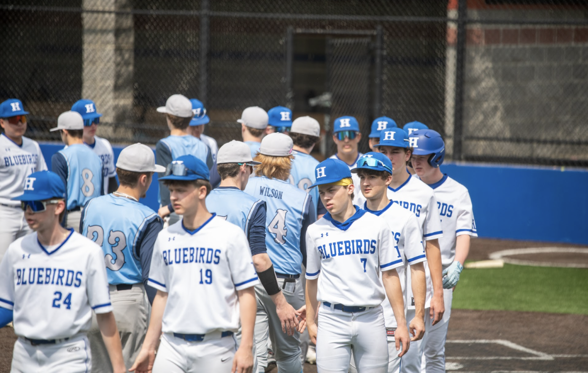 The birds shake hands with Boone County after their win. 
